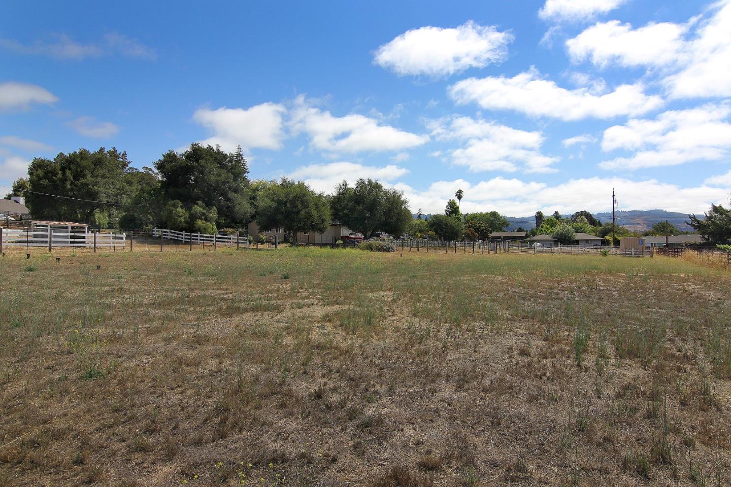 155 Wheelock Road Watsonville, CA 95076 - Photo 30 of 36 a view of a lake with houses in the back