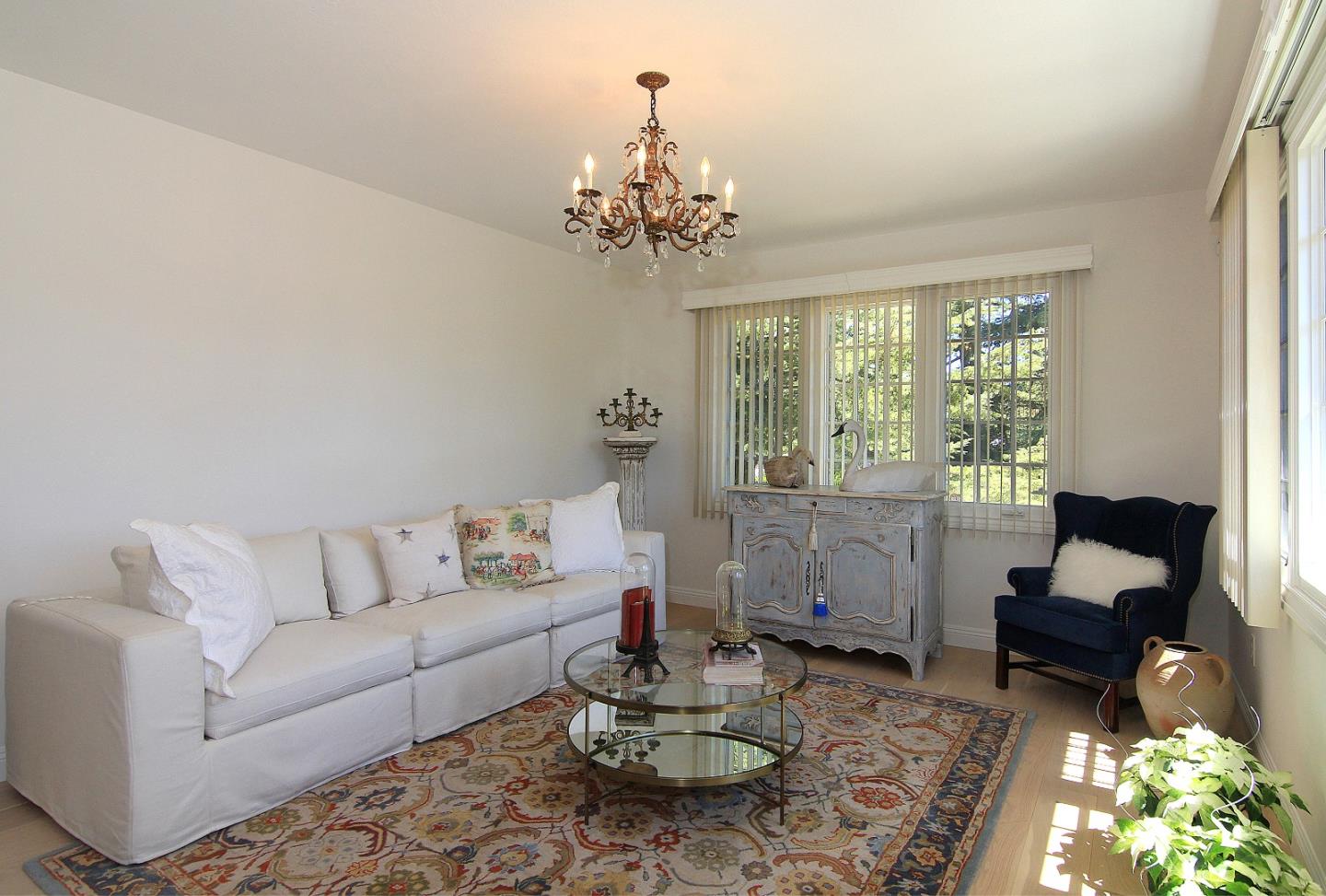 155 Wheelock Road Watsonville, CA 95076 - Photo 5 of 36 a living room with furniture and a chandelier