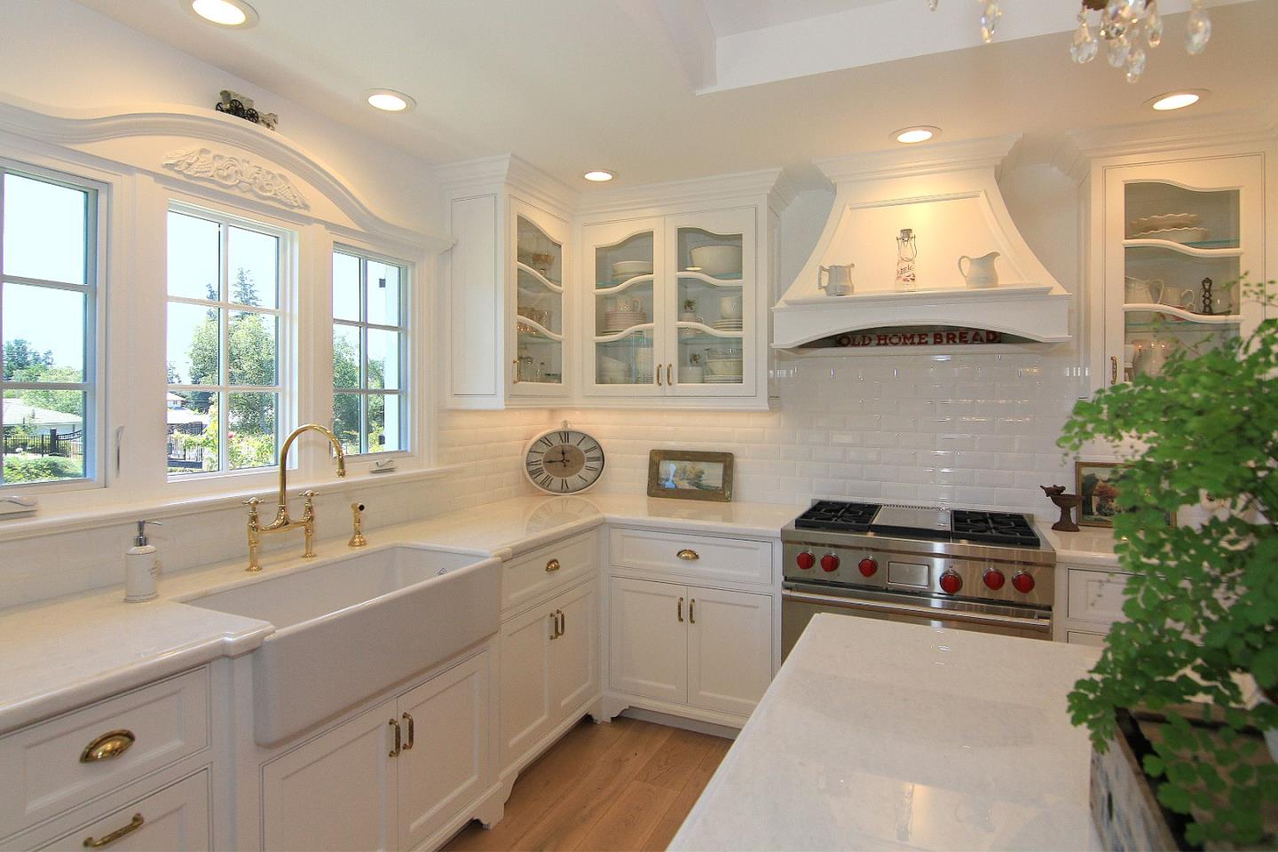 155 Wheelock Road Watsonville, CA 95076 - Photo 10 of 36 a kitchen with a sink stove and cabinets
