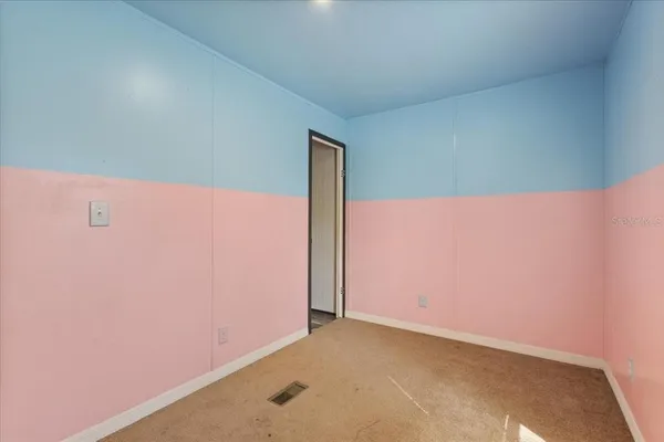 an empty room with an empty room