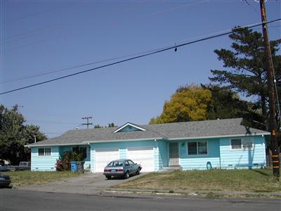 a car parked in front of a house