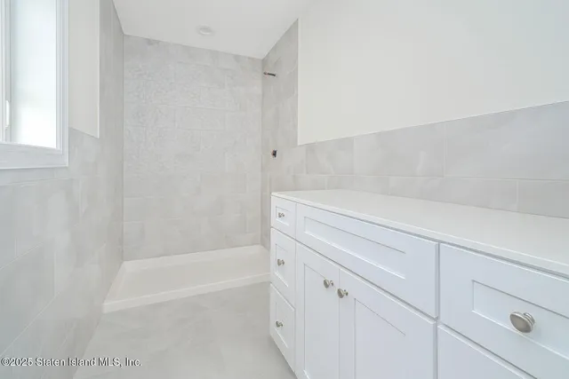 a bathroom with a bathtub