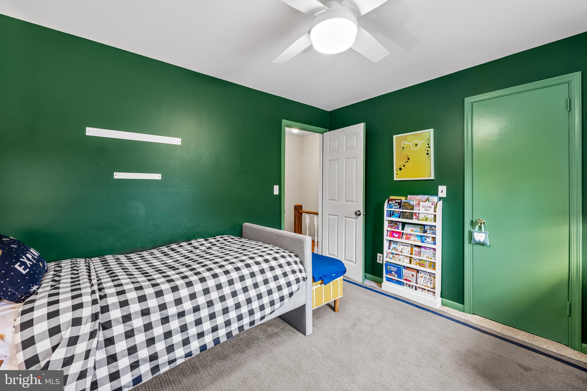 17 Sunnyview Drive Phoenix, MD 21131 - Photo 22 of 48 a bedroom with a bed and a bookshelf