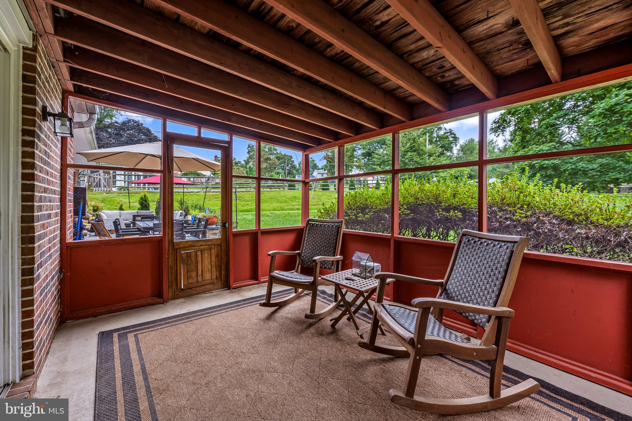 17 Sunnyview Drive Phoenix, MD 21131 - Photo 38 of 48 a view of a patio with a table chairs and a couple of potted plants