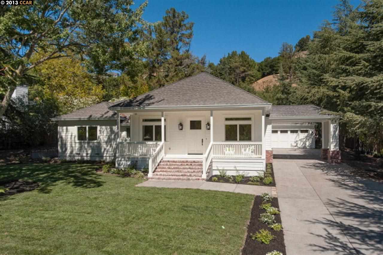 3848 Happy Valley Road Lafayette, CA 94549 - Photo 1 of 27 a front view of a house with a yard
