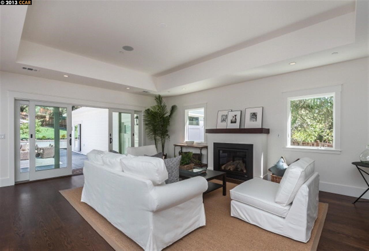 3848 Happy Valley Road Lafayette, CA 94549 - Photo 13 of 27 a living room with furniture and a fireplace