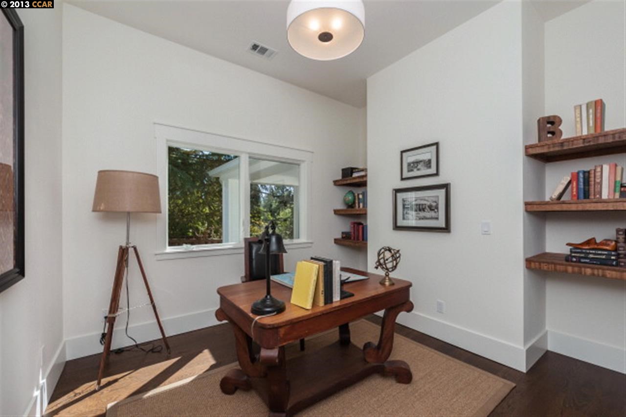 3848 Happy Valley Road Lafayette, CA 94549 - Photo 14 of 27 a living room with furniture and a book shelf