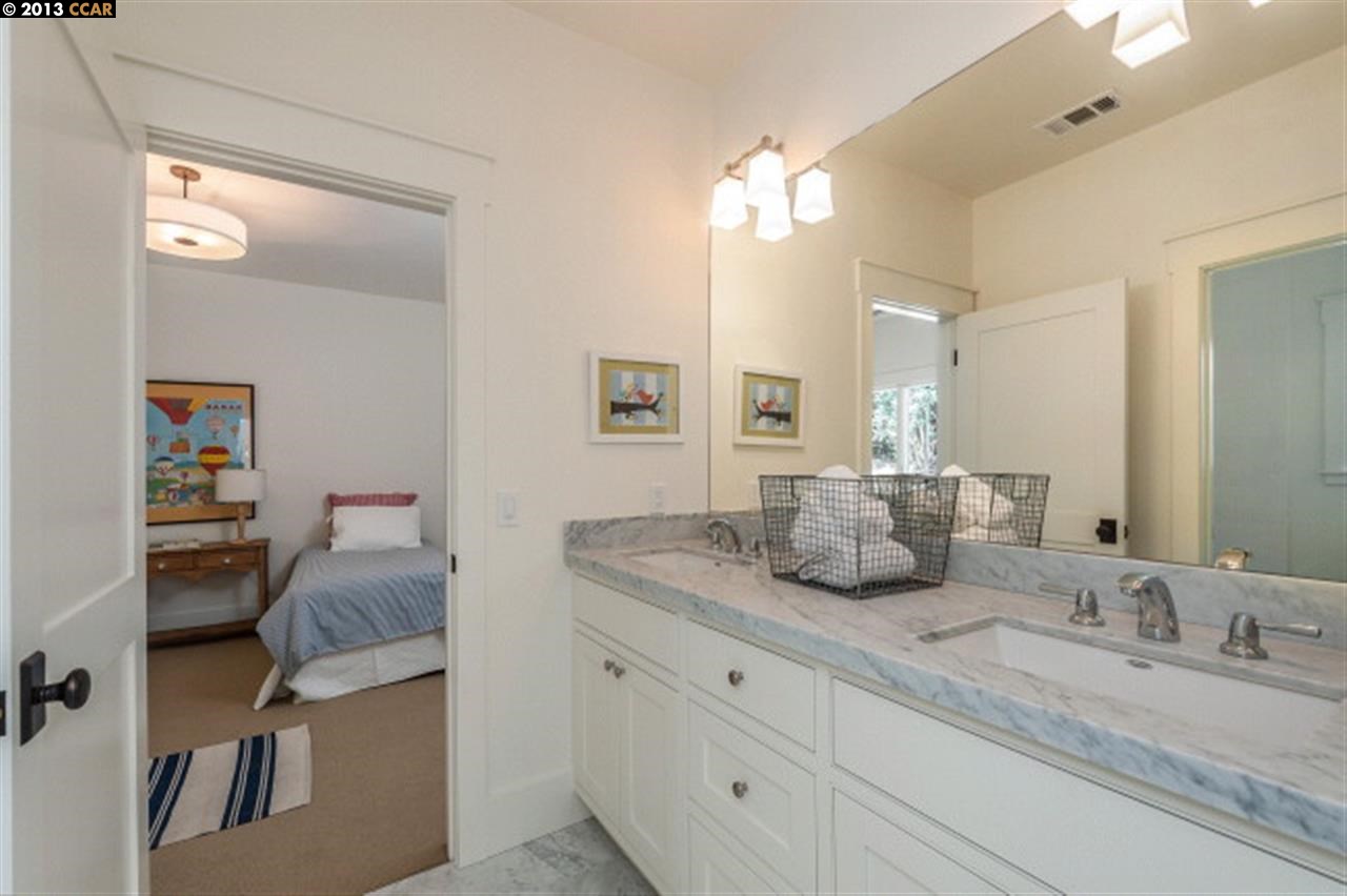 3848 Happy Valley Road Lafayette, CA 94549 - Photo 21 of 27 a en suite bathroom with double sink and a mirror