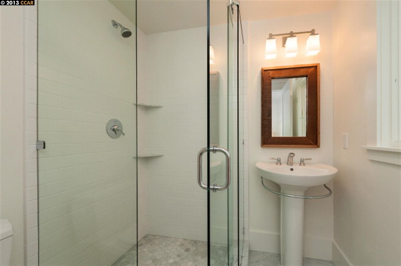 3848 Happy Valley Road Lafayette, CA 94549 - Photo 22 of 27 a bathroom with a sink and a mirror