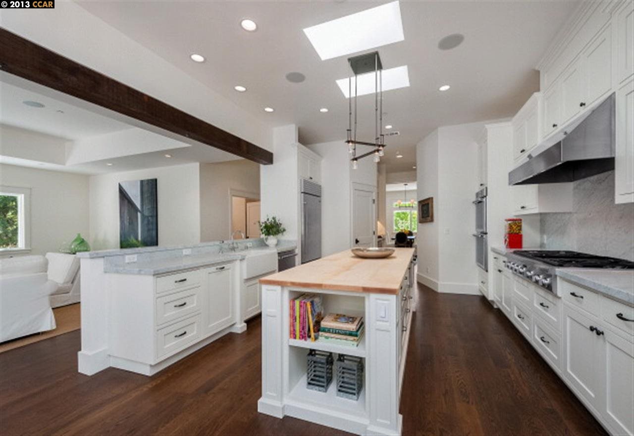 3848 Happy Valley Road Lafayette, CA 94549 - Photo 10 of 27 a kitchen with stainless steel appliances kitchen island granite countertop a stove a sink and a refrigerator