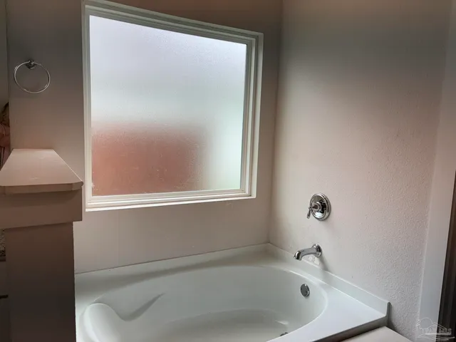 a bathroom with a bathtub