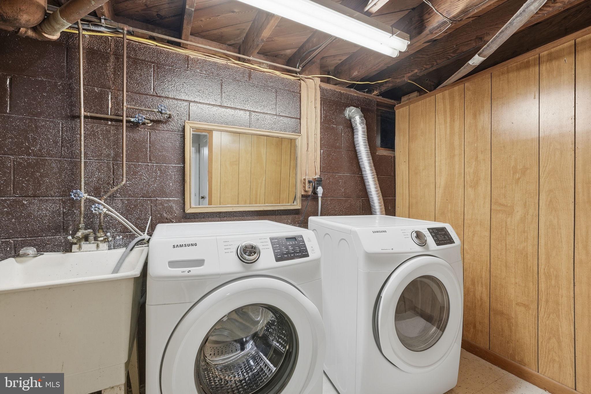 17509 Black Rock Road Germantown, MD 20874 - Photo 22 of 26 a utility room with dryer and washer