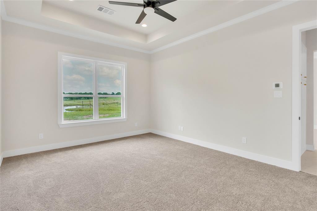 1028 Henry Way Springtown, TX 76082 - Photo 16 of 40 an empty room with windows