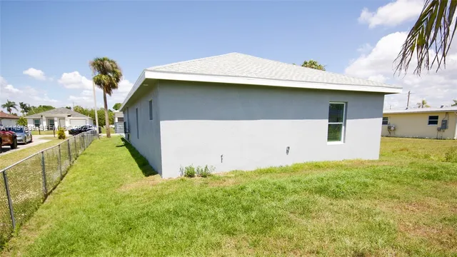 a house view with a garden space