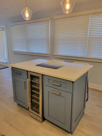 a kitchen with a stove and a sink