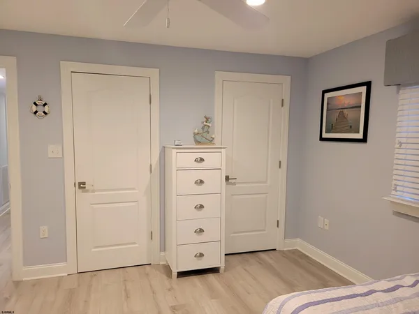 a view of a bedroom with closet
