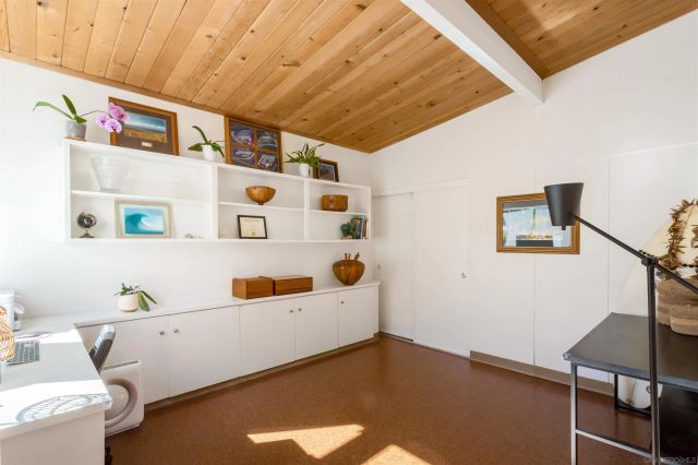 a bathroom with a tub and a sink