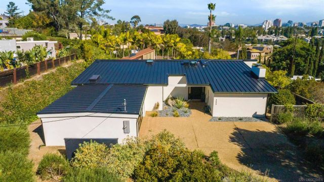 a view of a chairs and table on the wooden floor