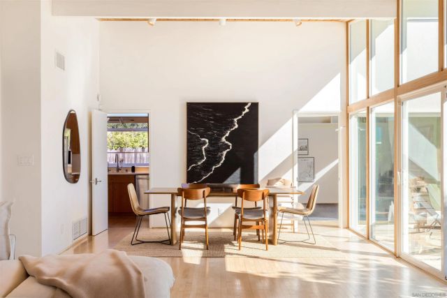 a work room with furniture and a window