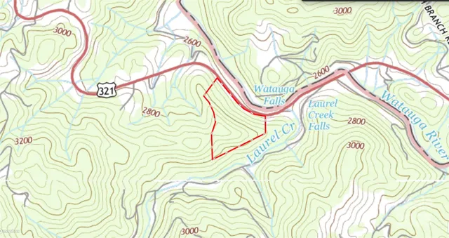 a view of a yard covered with snow in the background