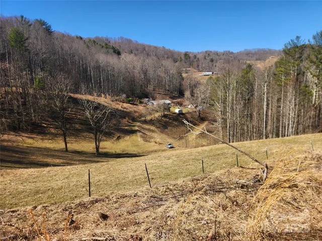 a view of a backyard of the house