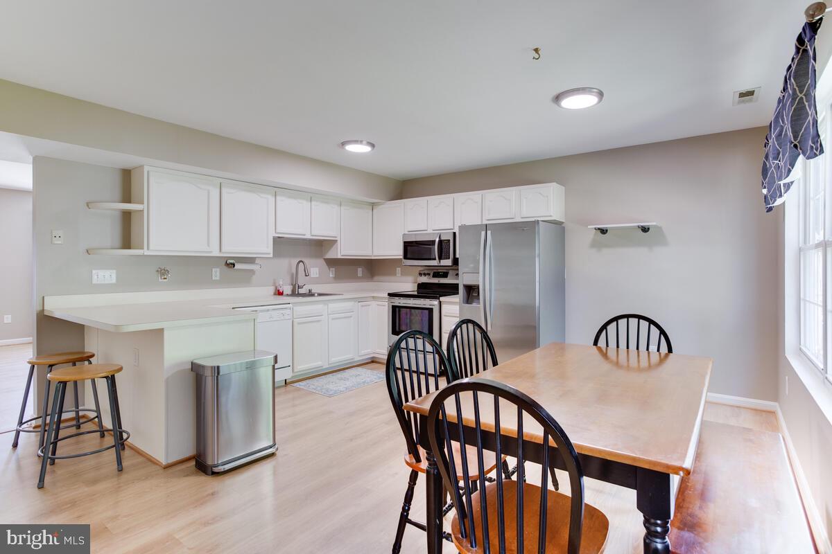 1642 Hilltop Road Edgewater, MD 21037 - Photo 9 of 34 Open Kitchen with dining