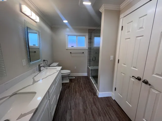 a bathroom with a sink and a large mirror