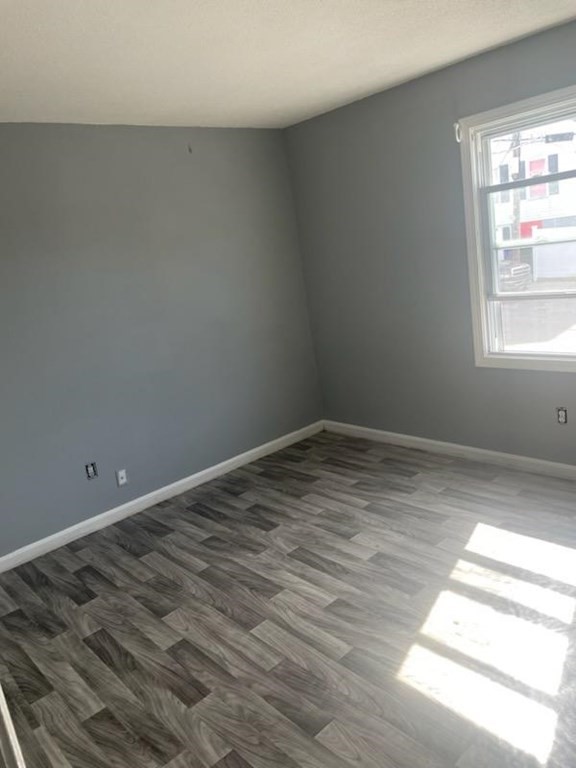 526 Third Street, Unit 6 Fall River, MA 02721 - Photo 2 of 3 a view of empty room with wooden floor
