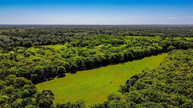 a view of a large green field