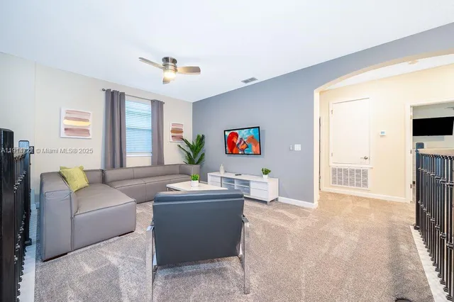 a room with furniture and wooden floor