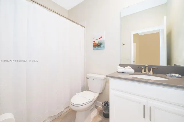 a view of a swimming pool with a yard