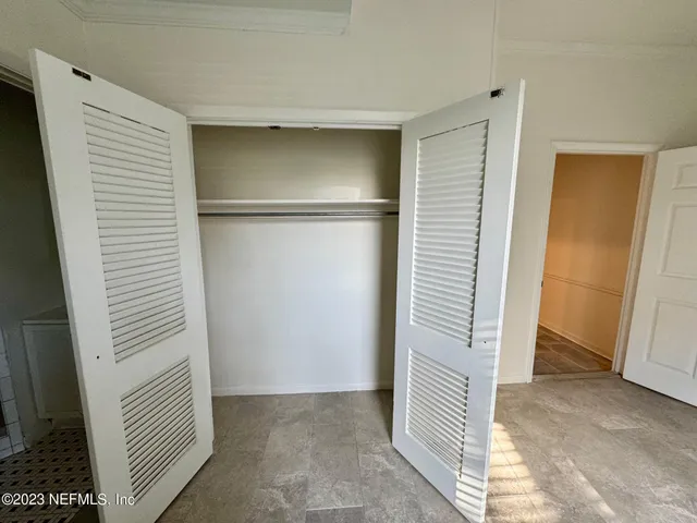 a view of a room with an empty space