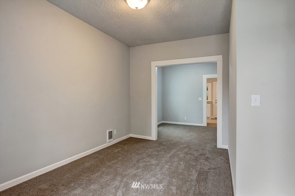 3406 Rockefeller Avenue Everett, WA 98201 - Photo 2 of 9 a view of an empty room and closet