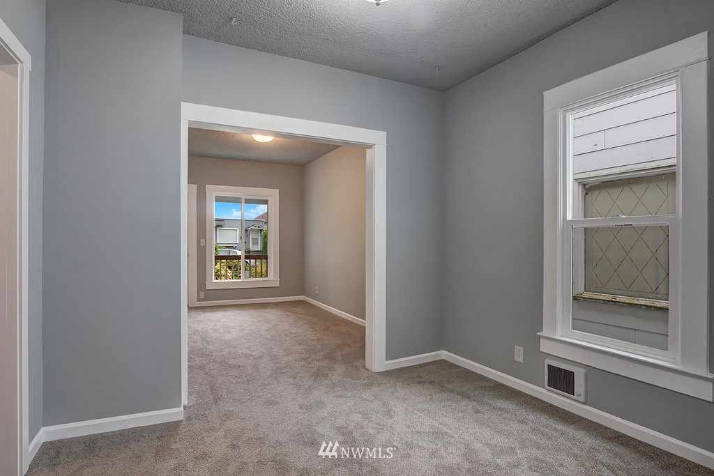 3406 Rockefeller Avenue Everett, WA 98201 - Photo 3 of 9 an empty room with windows
