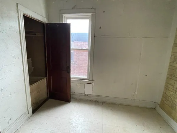 an empty room with window