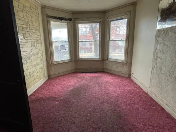 an empty room with windows