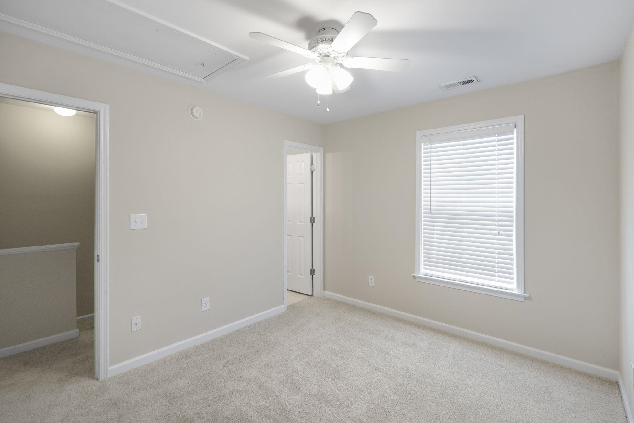 2312 Persimmon Ridge Drive Raleigh, NC 27604 - Photo 26 of 34 a view of an empty room with a window