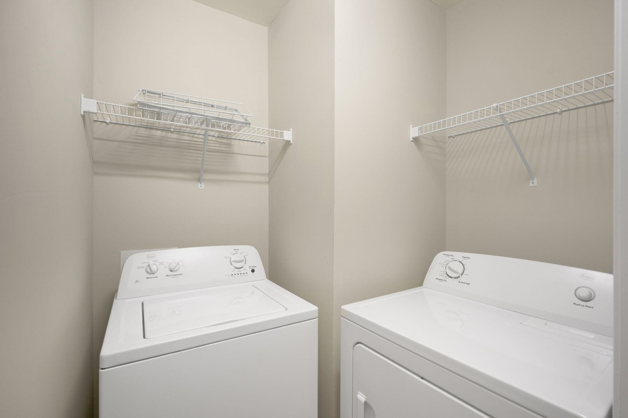 2312 Persimmon Ridge Drive Raleigh, NC 27604 - Photo 28 of 34 a view of storage and utility room with washer and dryer