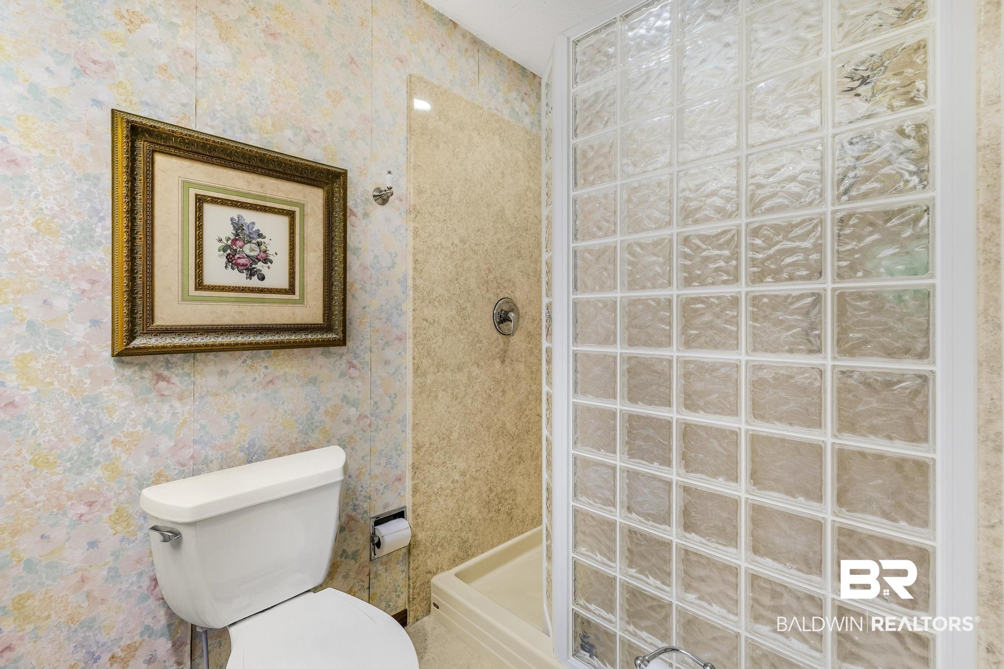 10207 Plantation Drive Daphne, AL 36526 - Photo 23 of 48 Bathroom with a stall shower and wallpapered walls