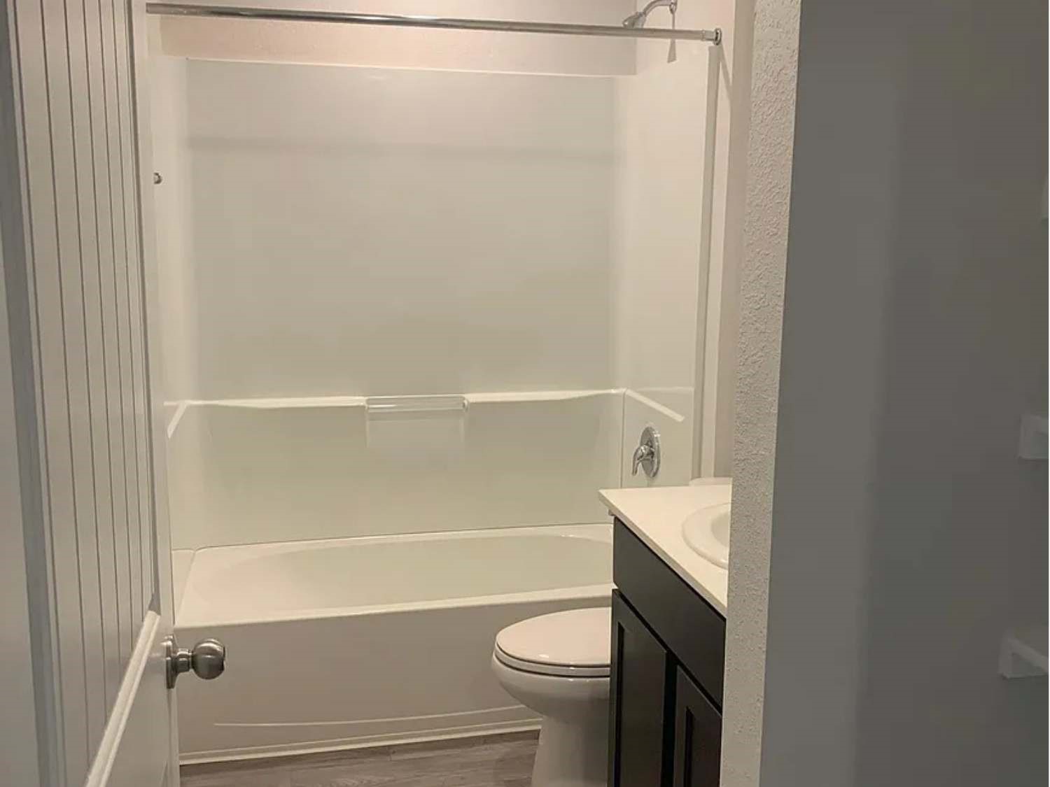 2416 Three Wood Way Navasota, TX 77868 - Photo 12 of 15 a bathroom with a sink a toilet and shower