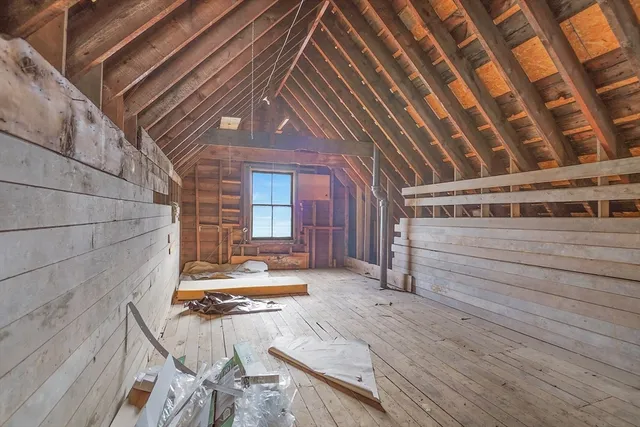 a view of swimming pool with seating space
