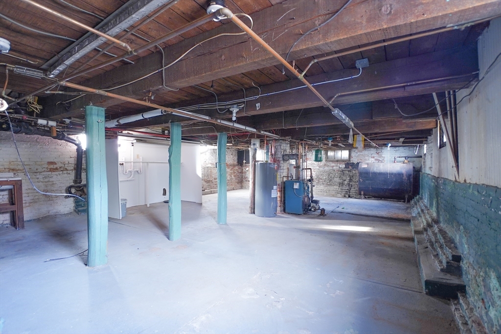 12 Temple Street Holyoke, MA 01040 - Photo 30 of 36 a view of an empty room with wooden roof