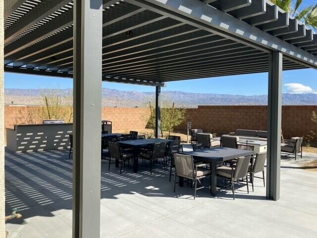 73707 Raphael Drive Palm Desert, CA 92211 - Photo 12 of 16 a view of a terrace with seating space
