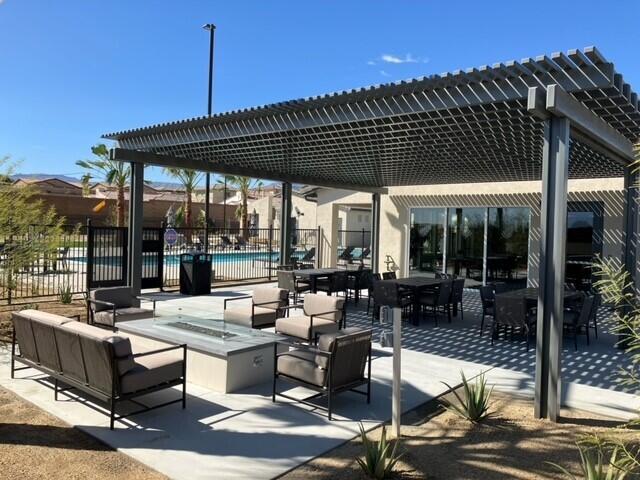 73707 Raphael Drive Palm Desert, CA 92211 - Photo 10 of 16 a patio with patio table and chairs