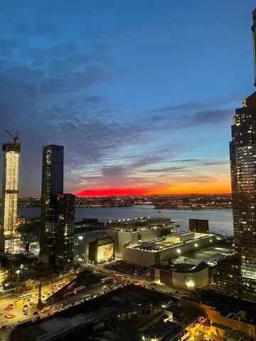 a view of a lake with a city
