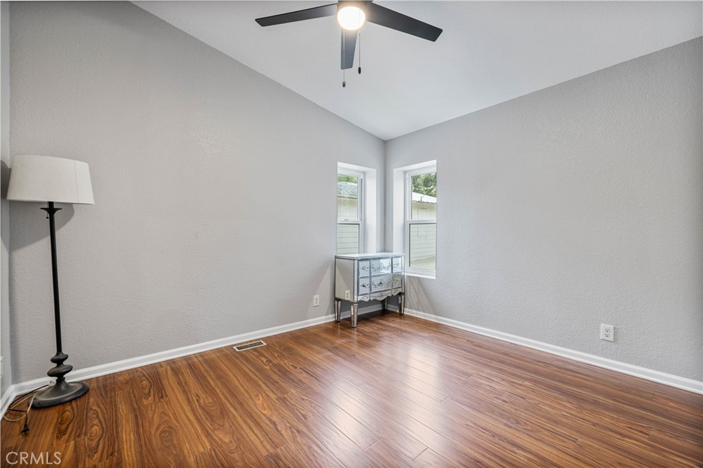 15608 Tierra Rejada Road Moorpark, CA 93021 - Photo 19 of 34 wooden floor in an empty room with a window