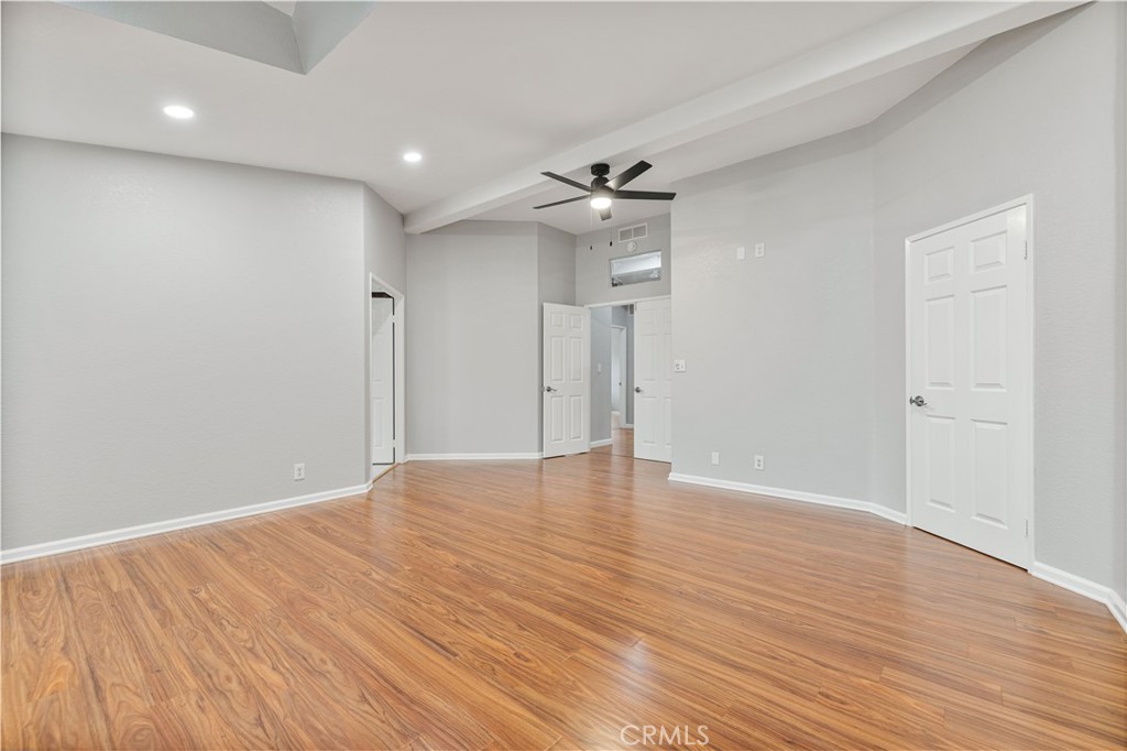 15608 Tierra Rejada Road Moorpark, CA 93021 - Photo 21 of 34 a view of an empty room with wooden floor