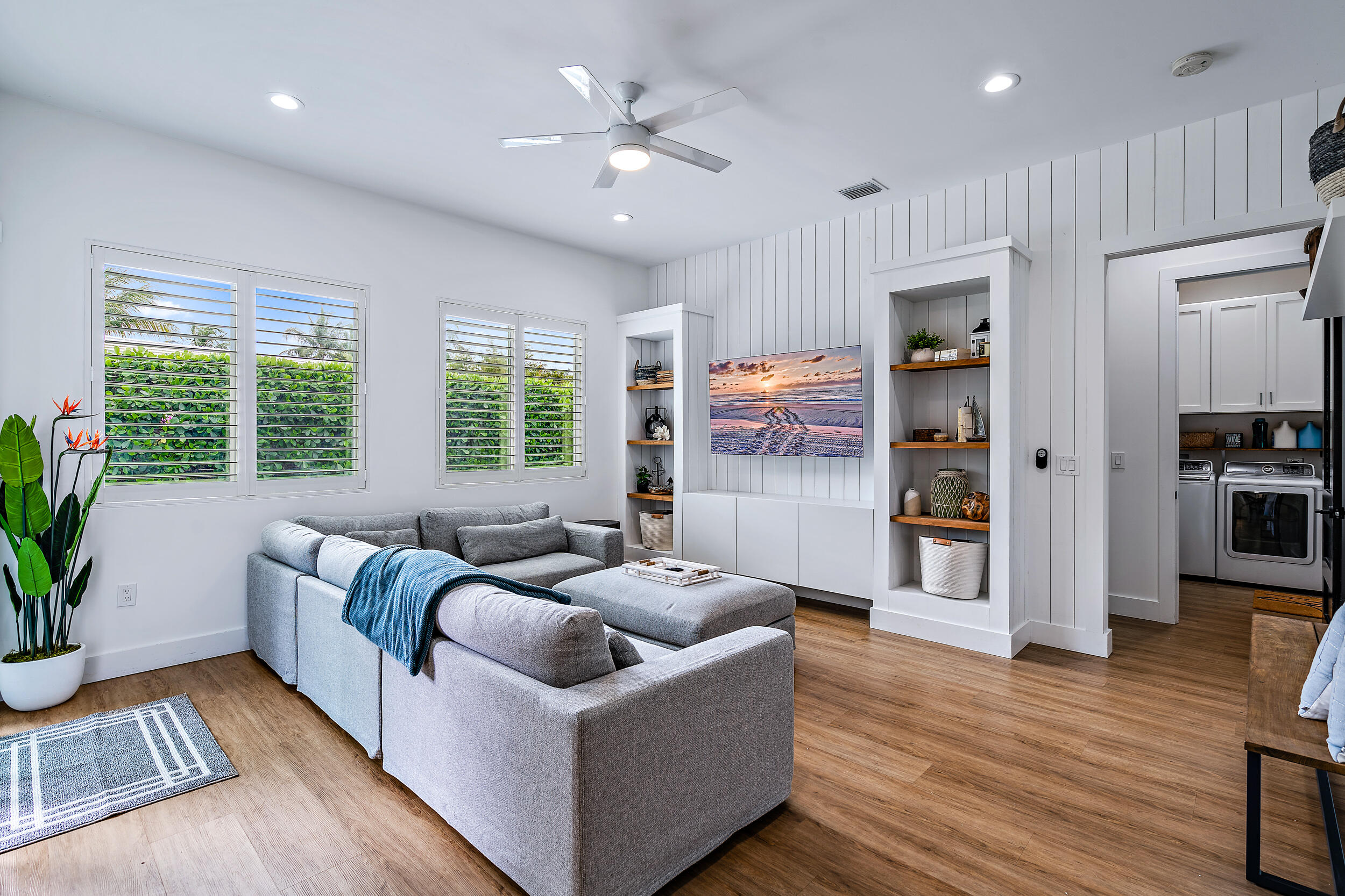 68 Azalea Circle Tequesta, FL 33469 - Photo 11 of 36 a living room with furniture and a large window