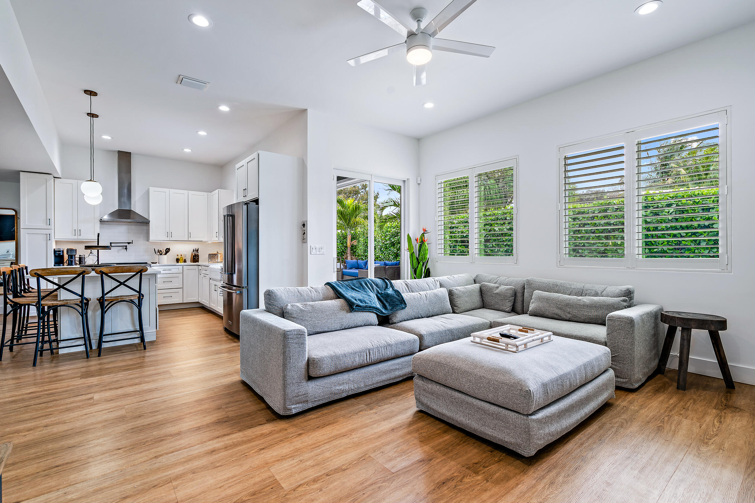 68 Azalea Circle Tequesta, FL 33469 - Photo 12 of 36 a living room with furniture and a large window