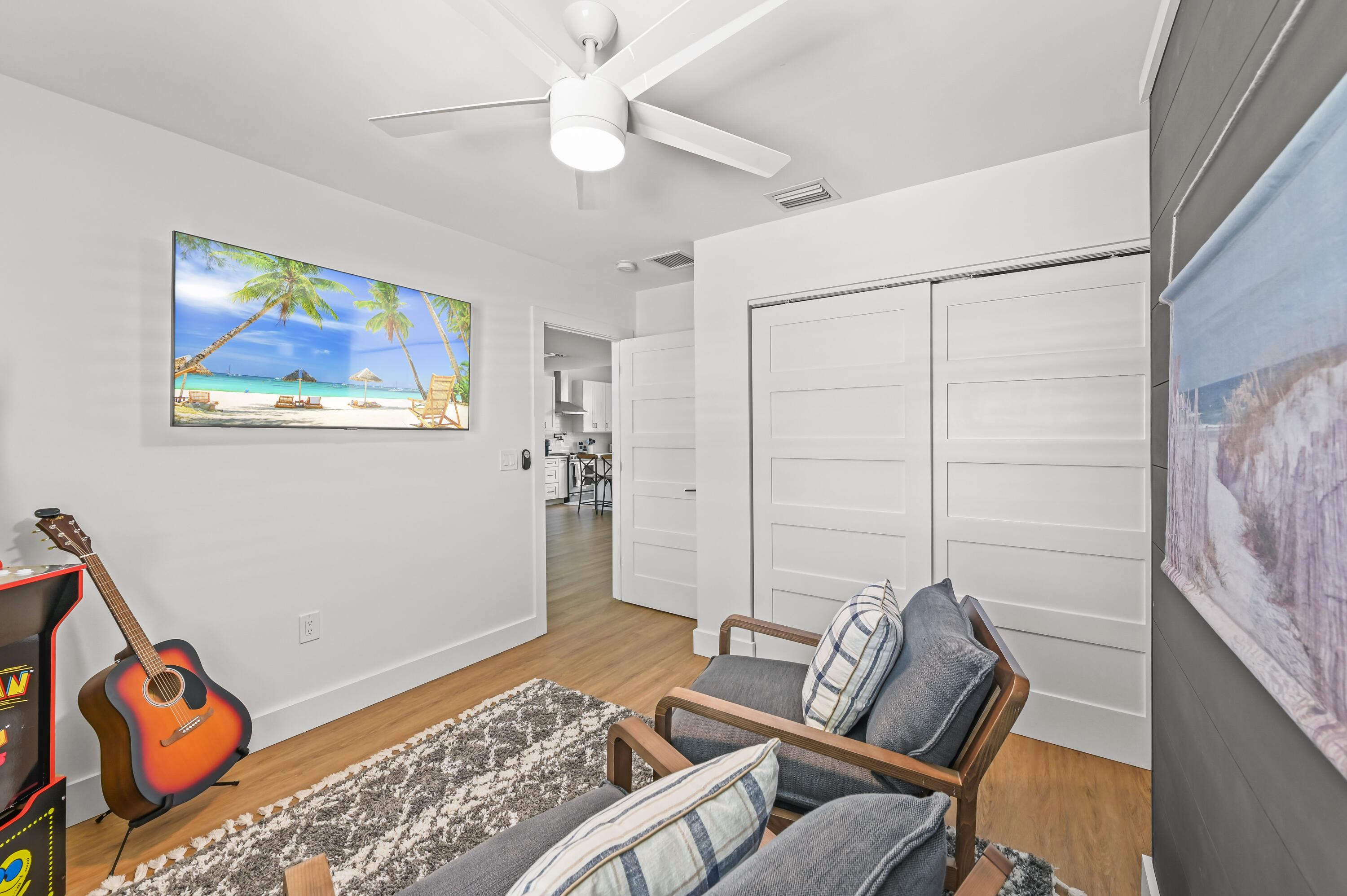 68 Azalea Circle Tequesta, FL 33469 - Photo 26 of 36 a bedroom with furniture and a rug